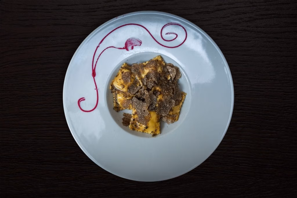 Quadrelli di ricotta al tartufo nero
